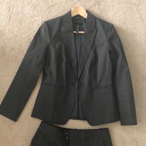 Grey pinstriped suit